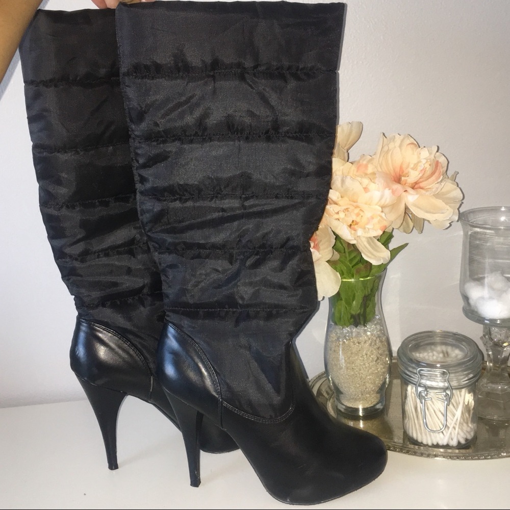 Steve Madden black high heeled winter boots.